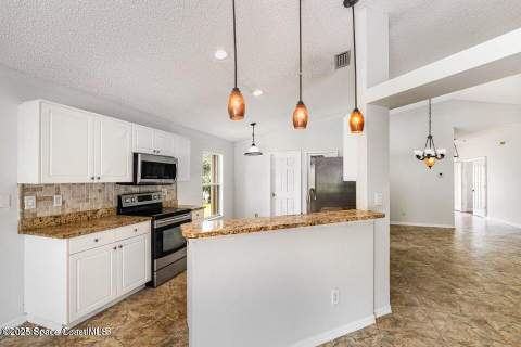 8426 Mizell Drive, Melbourne FL - photo 9 of 26