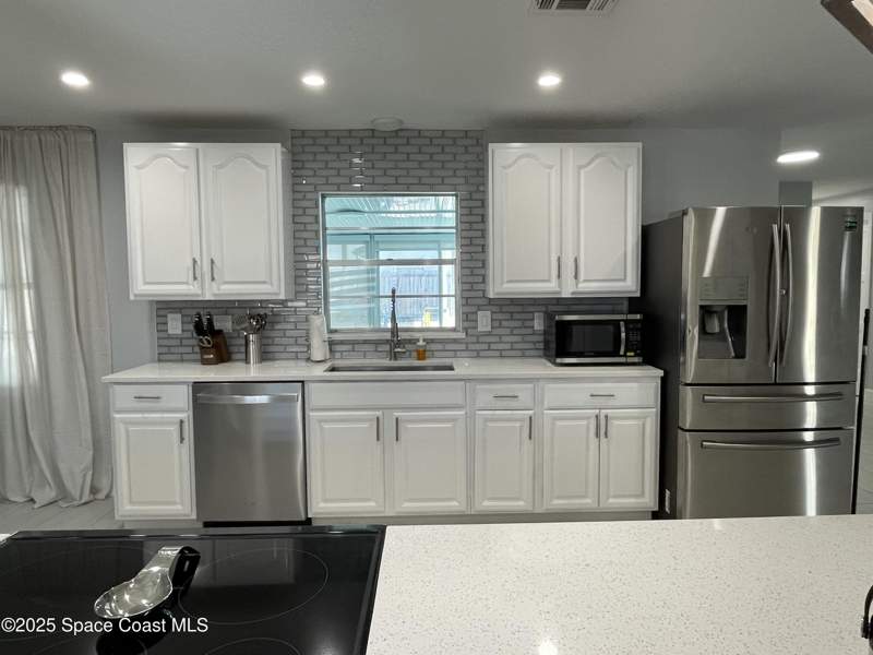 3 bedroom Single Family Residence at 1695 N Banana River Drive, Riviera Isles Sec 2, Merritt Island — photo 2