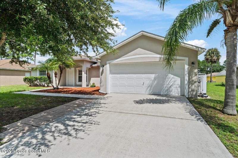 3 bedroom Single Family Residence at 433 Haleybury Street, Port Malabar Unit 31, Palm Bay — photo 2