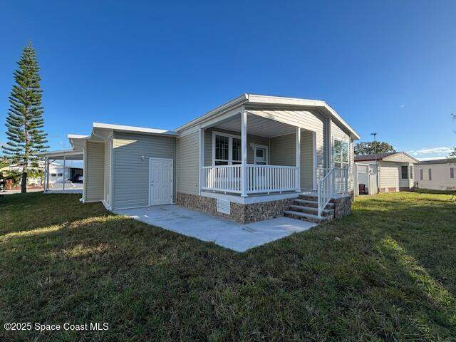 3 bedroom Manufactured Home at 723 Hyacinth Circle, Barefoot Bay Unit 2 Part 10, Barefoot Bay — photo 4