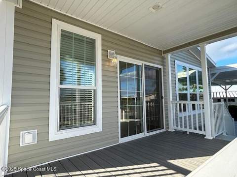 723 Hyacinth Circle, Barefoot Bay FL - photo 7 of 25
