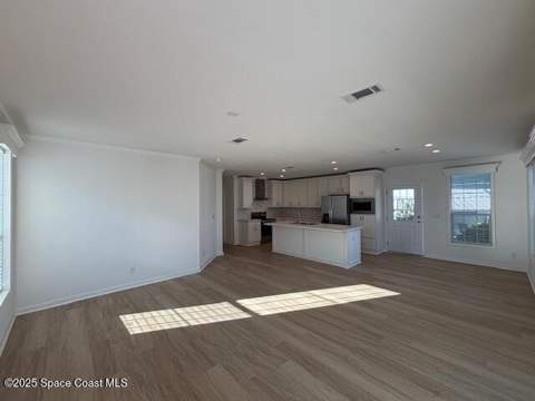 723 Hyacinth Circle, Barefoot Bay FL - photo 10 of 25