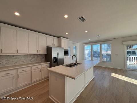 723 Hyacinth Circle, Barefoot Bay FL - photo 13 of 25