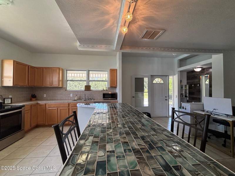 5 bedroom Single Family Residence at 9590 Primrose Drive, Sebastian River Estates, Micco — photo 5