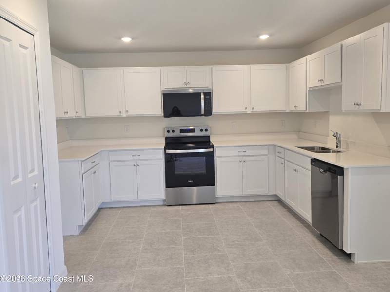 4 bedroom Single Family Residence at 972 SW Richmond Circle, Richmond Cove, Palm Bay — photo 3