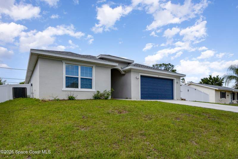 4 bedroom Single Family Residence at 866 Carnival Road Se Road, Port Malabar Unit 12, Palm Bay — photo 3