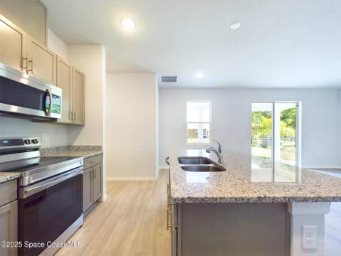 1085 SW Harlingen Road, Palm Bay FL - photo 6 of 42