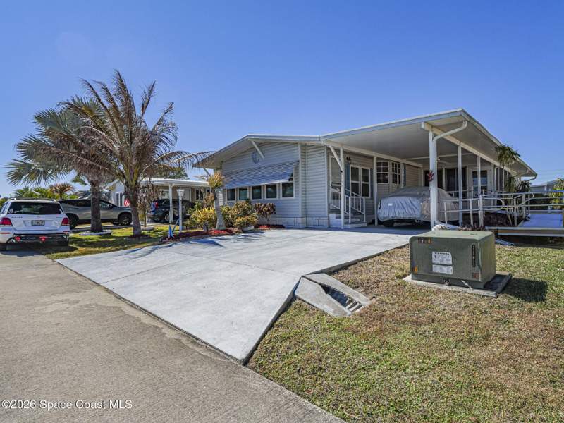 2 bedroom Manufactured Home at 7566 Montauk Avenue #U19, Snug Harbor Lakes Condo, Micco — photo 2