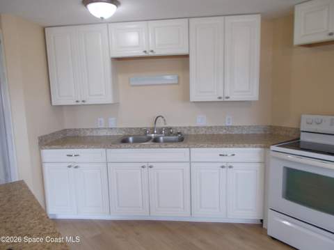 932 Cashew Circle, Barefoot Bay FL - photo 7 of 28