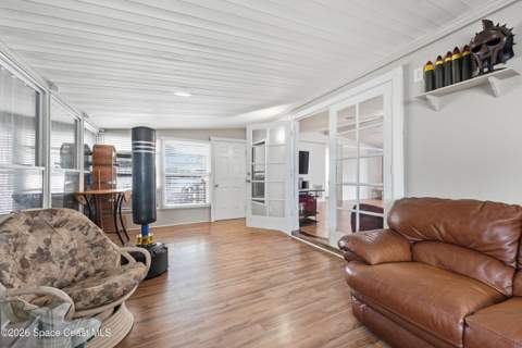 566 Dolphin Circle, Barefoot Bay FL - photo 6 of 37