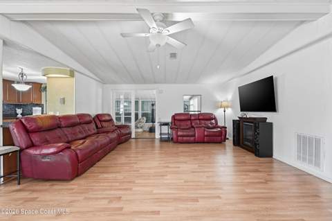 566 Dolphin Circle, Barefoot Bay FL - photo 7 of 37