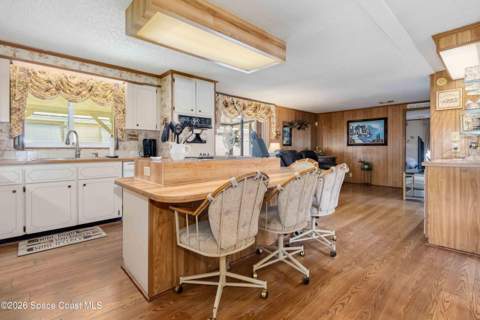 703 Amaryllis Drive, Barefoot Bay FL - photo 8 of 28