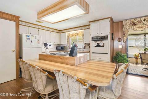 703 Amaryllis Drive, Barefoot Bay FL - photo 9 of 28