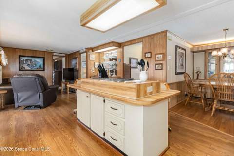 703 Amaryllis Drive, Barefoot Bay FL - photo 11 of 28
