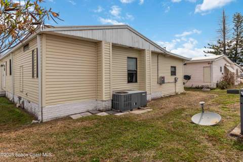 703 Amaryllis Drive, Barefoot Bay FL - photo 19 of 28