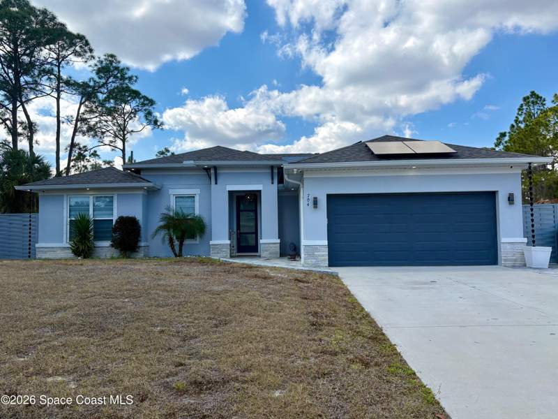 4 bedroom Single Family Residence at 704 Griffin Avenue, Port Malabar Unit 36, Palm Bay — photo 2