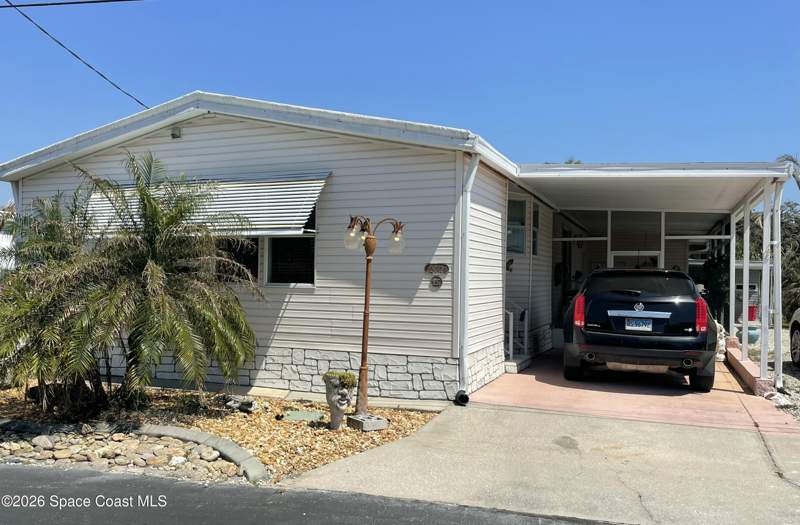 2 bedroom Manufactured Home at 3012 Indian River Drive, Palm Bay Estates Mobile Home Park Co/Op of Tropic, Palm Bay — photo 2