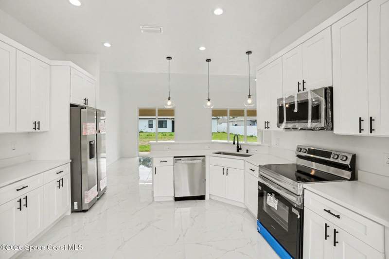 4 bedroom Single Family Residence at 3267 Halacka Avenue, Port Malabar Unit 25, Palm Bay — photo 3