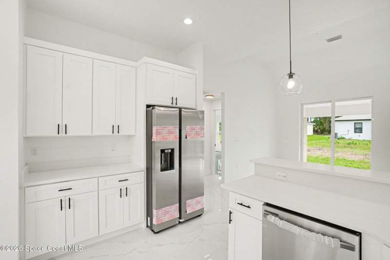 4 bedroom Single Family Residence at 3267 Halacka Avenue, Port Malabar Unit 25, Palm Bay — photo 4