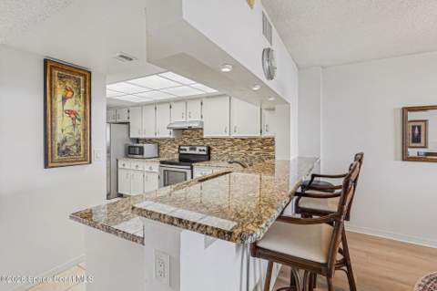 1860 N Atlantic Avenue #204, Cocoa Beach FL - photo 11 of 43