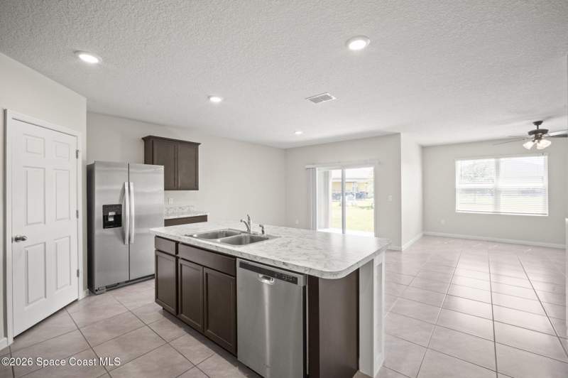 4 bedroom Single Family Residence at 3009 Burrowing Owl Drive, Rymar Greens at Indian River Preserve, Mims — photo 4