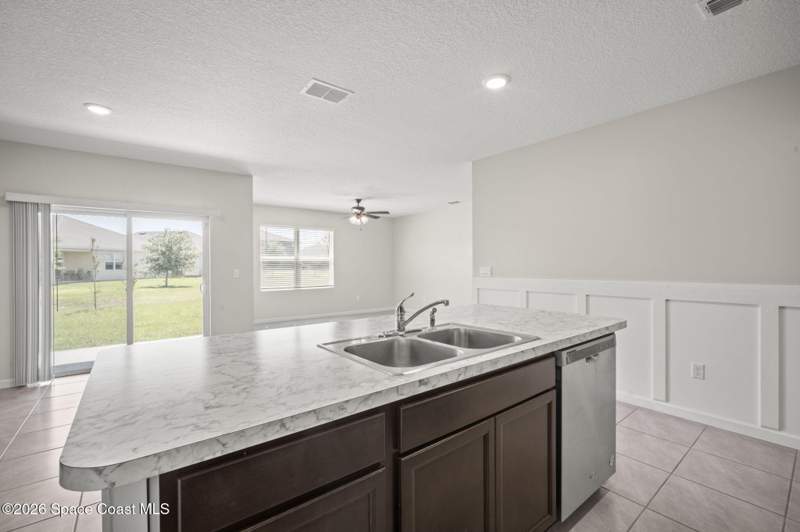 4 bedroom Single Family Residence at 3009 Burrowing Owl Drive, Rymar Greens at Indian River Preserve, Mims — photo 5