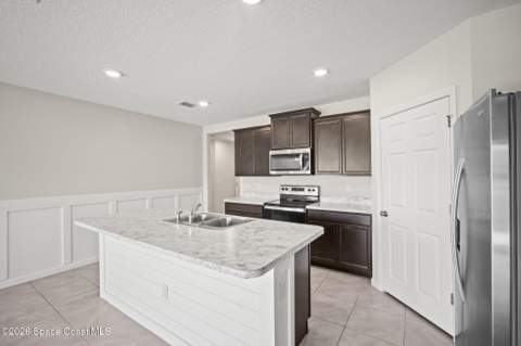 3009 Burrowing Owl Drive, Mims FL - photo 6 of 27
