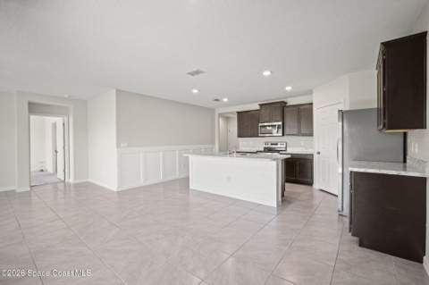 3009 Burrowing Owl Drive, Mims FL - photo 8 of 27