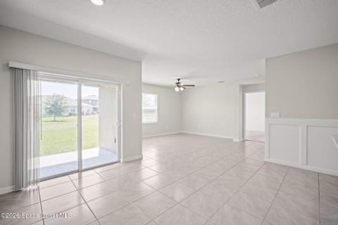 3009 Burrowing Owl Drive, Mims FL - photo 11 of 27