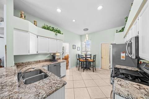 1044 Harbor Pines Drive, Merritt Island FL - photo 18 of 37