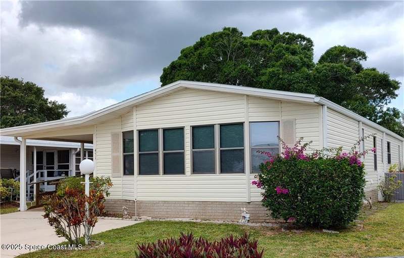 2 bedroom Manufactured Home at 451 Papaya Circle, Barefoot Bay Unit 1, Barefoot Bay — photo 2