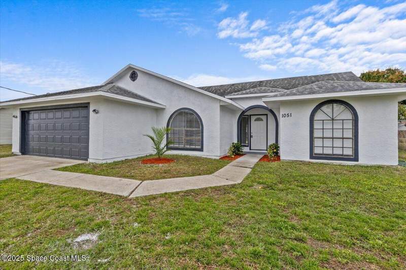 3 bedroom Single Family Residence at 1051 Flower Street, Port Malabar Unit 42, Palm Bay — photo 2