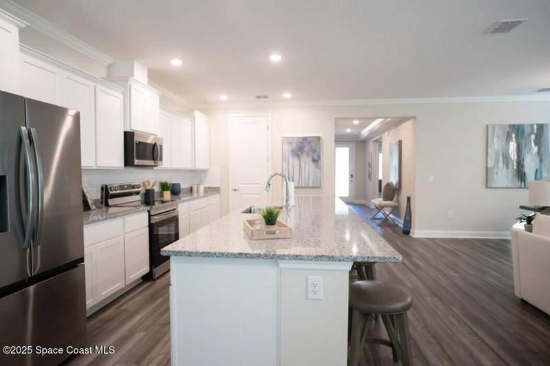 4 bedroom Single Family Residence at 1030 Barbados Avenue, Port Malabar Unit 12, Palm Bay — photo 3