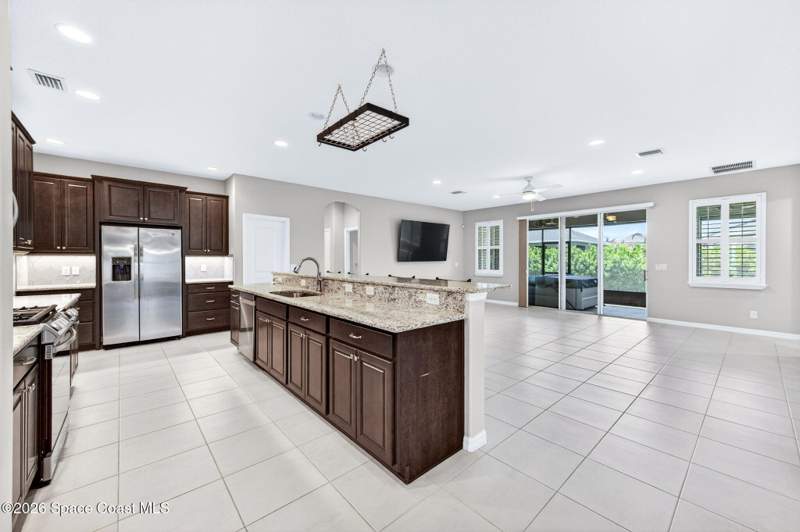 5 bedroom Single Family Residence at 7945 Millbrook Avenue, Sendero Cove & Sierra Cove At Addison Village Phase 1, Melbourne — photo 4