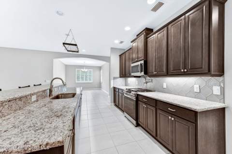 7945 Millbrook Avenue, Melbourne FL - photo 8 of 102