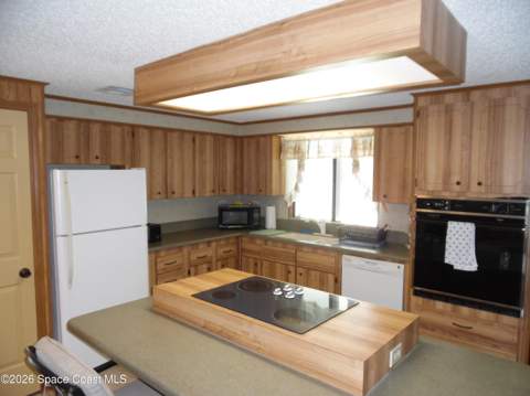 503 Seagull Drive, Barefoot Bay FL - photo 20 of 40