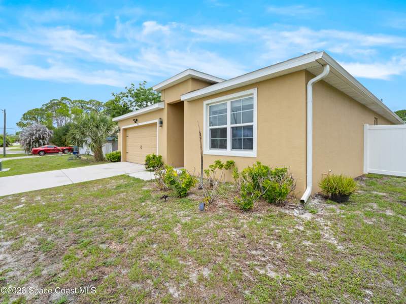 4 bedroom Single Family Residence at 104 Carmelite Avenue, Port Malabar Unit 14, Palm Bay — photo 4