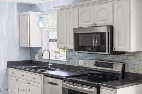 1240 Colby Lane, Merritt Island FL - photo 24 of 59