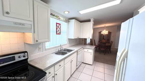 249 Kiwi Drive, Barefoot Bay FL - photo 8 of 39