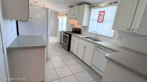 249 Kiwi Drive, Barefoot Bay FL - photo 9 of 39