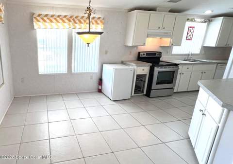 249 Kiwi Drive, Barefoot Bay FL - photo 11 of 39