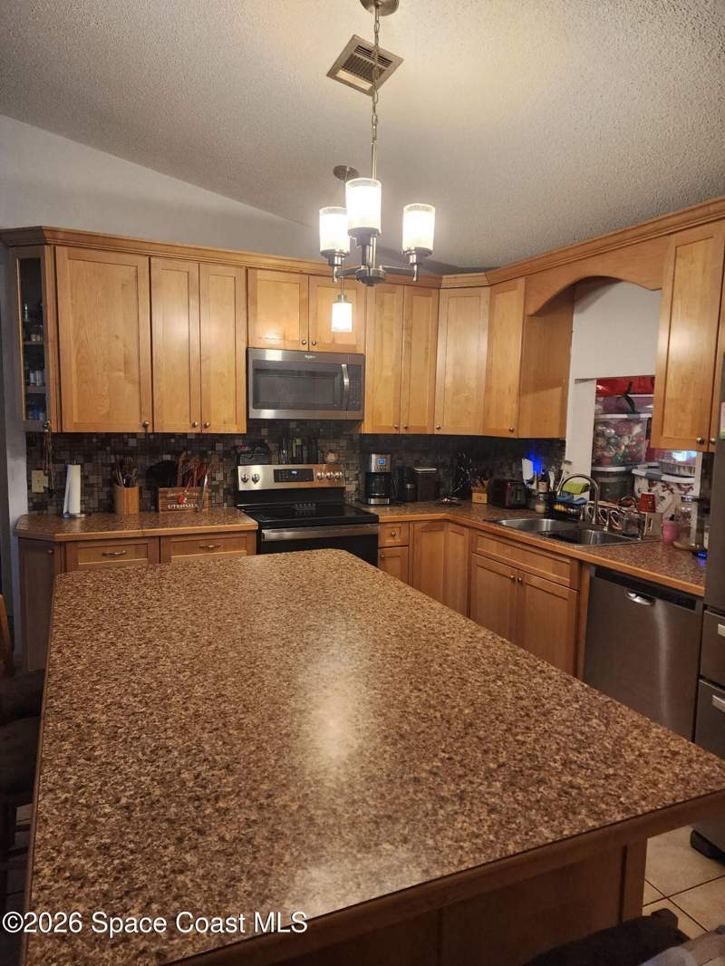 3 bedroom Single Family Residence at 913 Commerce Road, Port Malabar Unit 12, Palm Bay — photo 4