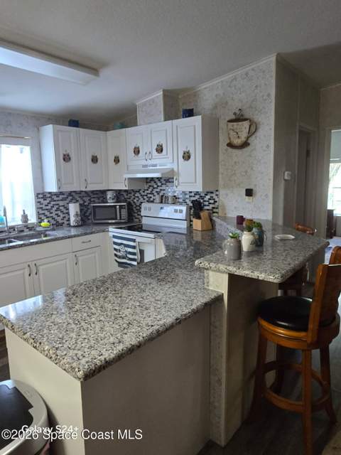 858 Pecan Circle, Barefoot Bay FL - photo 12 of 18