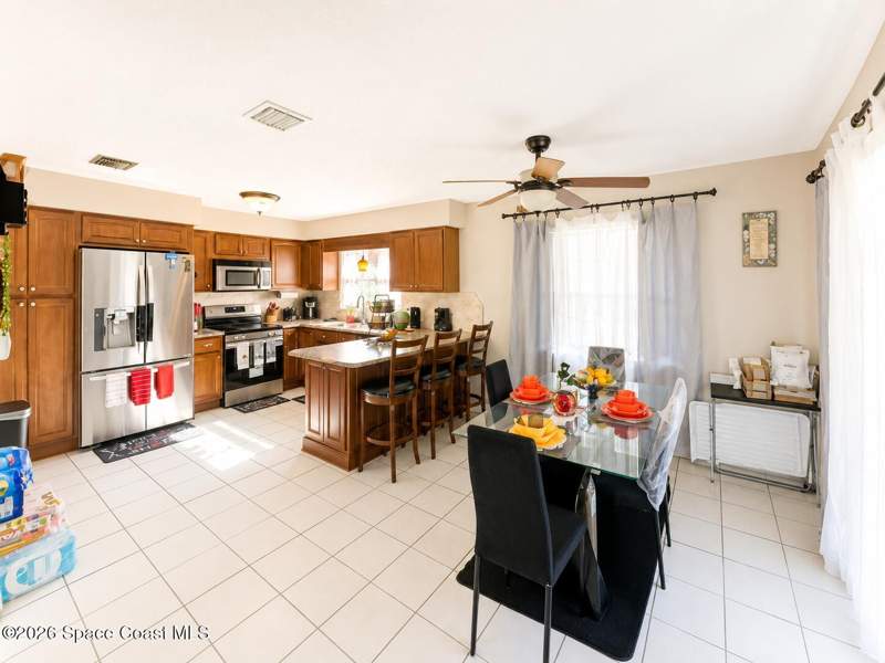 4 bedroom Single Family Residence at 4345 Elliot Avenue, Whispering Lakes 3rd Sec Part 1, Titusville — photo 4