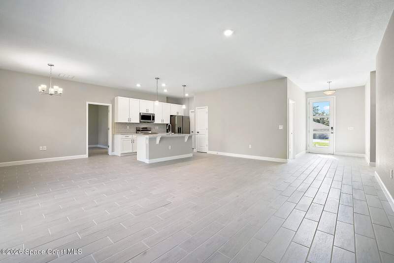 4 bedroom Single Family Residence at 950 Bartram Street, Port Malabar Unit 36, Palm Bay — photo 5