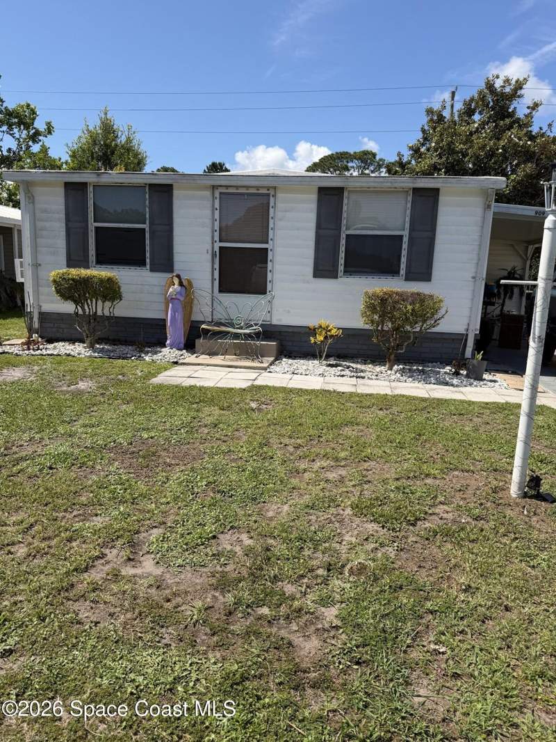 2 bedroom Manufactured Home at 909 Vireo Drive, Barefoot Bay Unit 2 Part 13, Barefoot Bay — photo 2