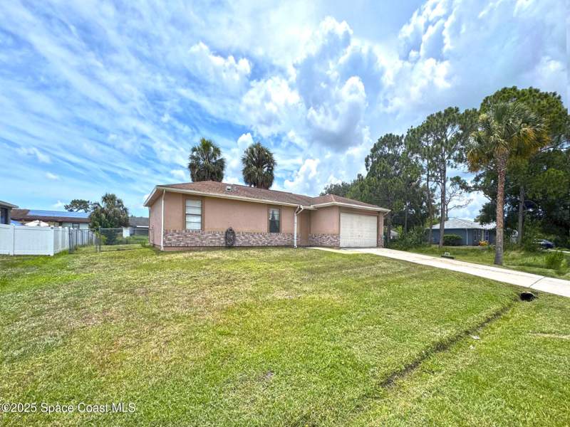 3 bedroom Single Family Residence at 1470 SE Toy Street, Port Malabar Unit 18, Palm Bay — photo 2