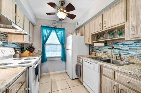 152 E East Colonial Court Court #84, Indian Harbour Beach FL - photo 10 of 25