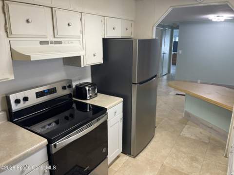 621 Oleander Circle, Barefoot Bay FL - photo 10 of 27