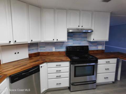 763 Lark Drive, Barefoot Bay FL - photo 7 of 25